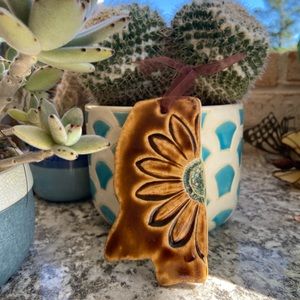 Tab Boren Handmade 3X6 Ceramic Mississippi Ornament with Teal Centered Flower